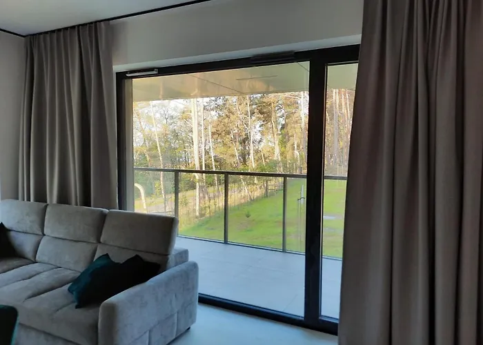 Апартаменты Sloneczny Aktena Shellter *